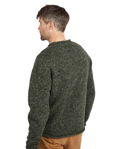 Green Coloured Aran Donegal Wool Crew Neck Sweater on white background 