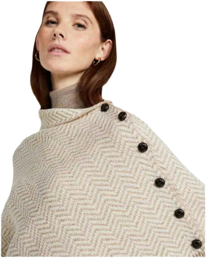 Cream Coloured Aran Herringbone Poncho with Buttons on white background 