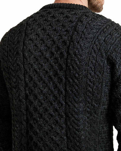 Charcoal coloured Aran Mens Inishbofin Traditional Sweater on white background 