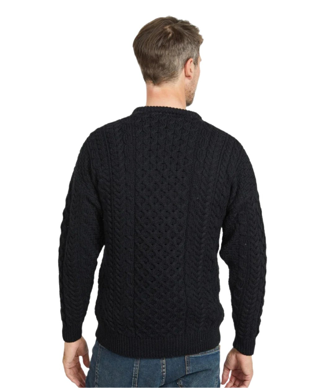 Black Coloured Aran Inisheer Traditional Sweater on white background 