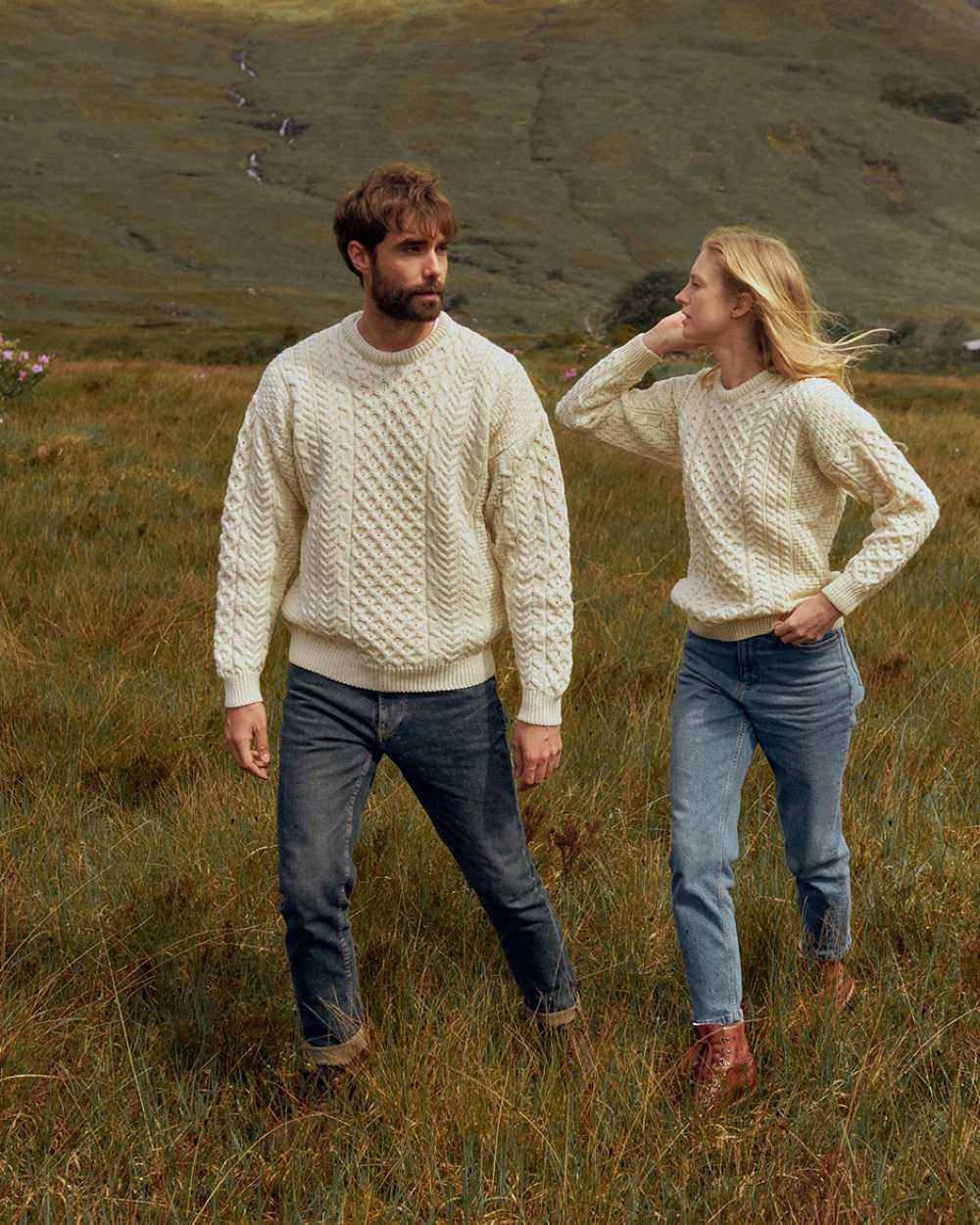 Cream Coloured Aran Inisheer Traditional Sweater on mountain background 