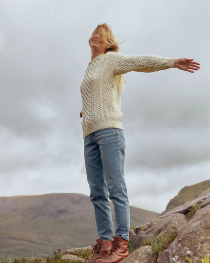 Cream Coloured Aran Inisheer Traditional Sweater on sky background 