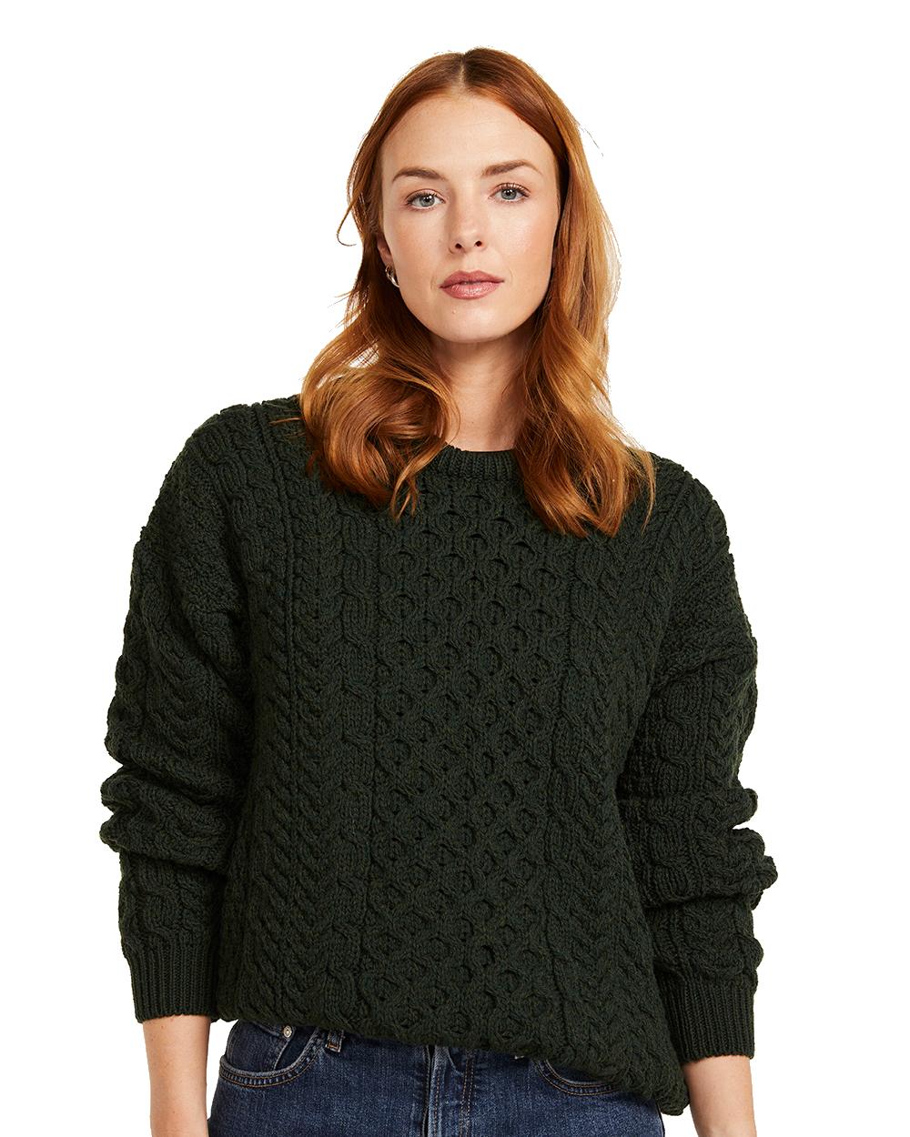 Forest Green Coloured Aran Inisheer Traditional Sweater on white background 