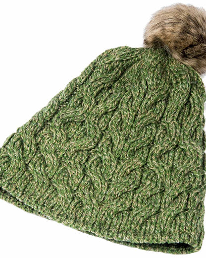 Sage Green Coloured Aran Knitted Faux Fur Bobble Hat on white background 