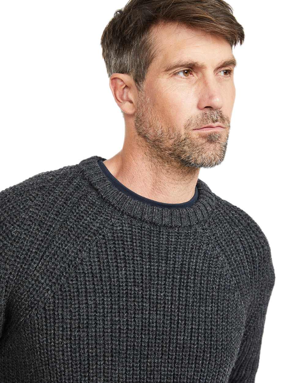 Charcoal Coloured Aran Mens Fisherman Raglan Crew Sweater on white background 