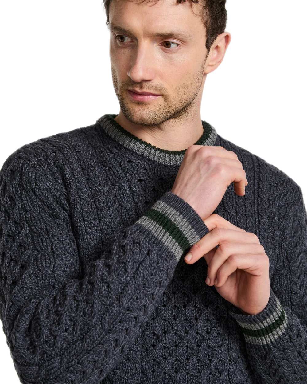 Dark Grey Coloured Aran Mens Inishbeg Stripe Crewneck Merino Sweater on white background 