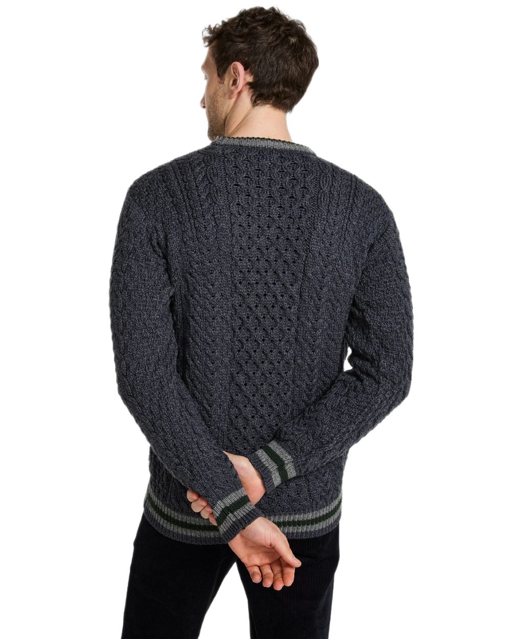 Dark Grey Coloured Aran Mens Inishbeg Stripe Crewneck Merino Sweater on white background 