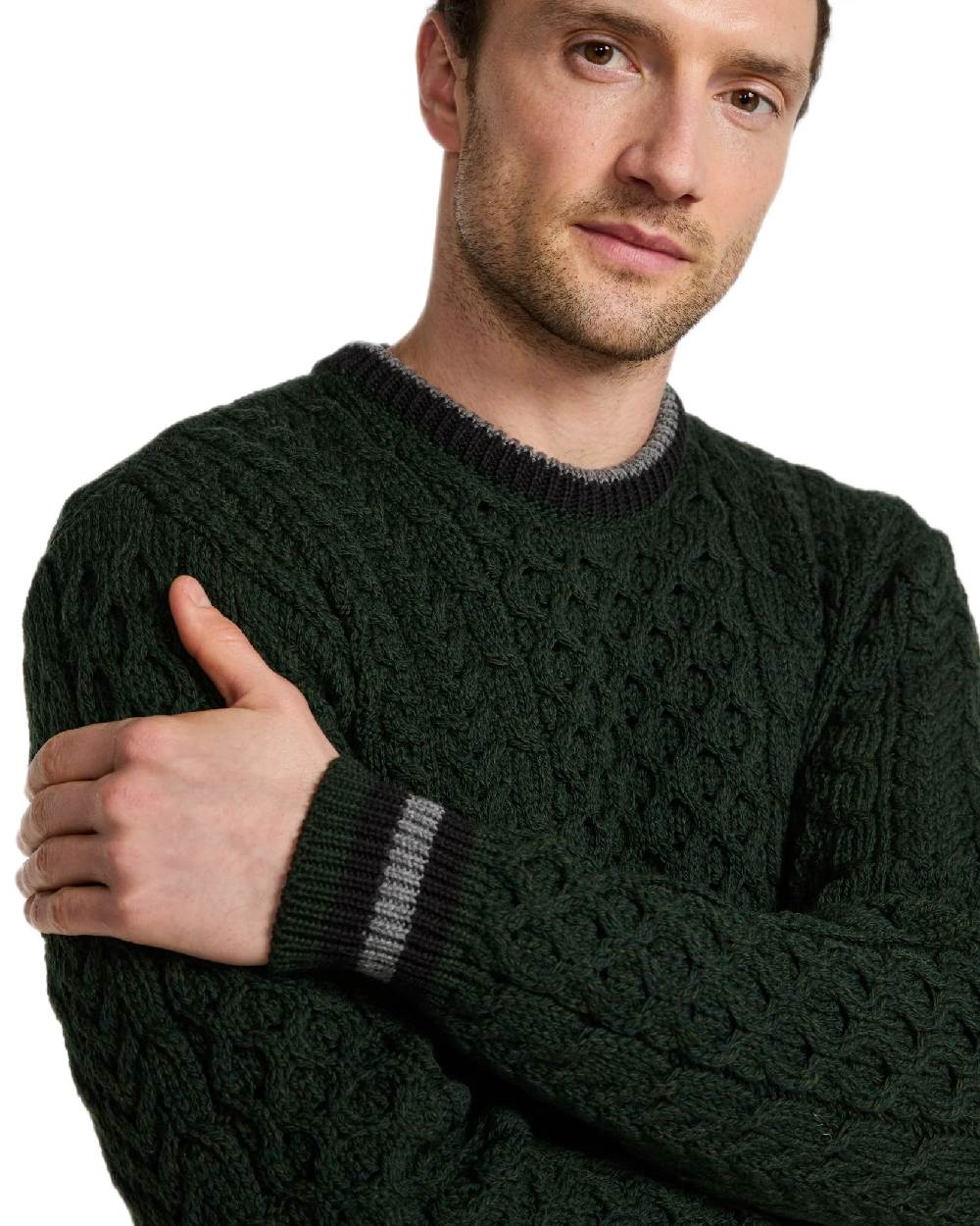 Green Coloured Aran Mens Inishbeg Stripe Crewneck Merino Sweater on white background 