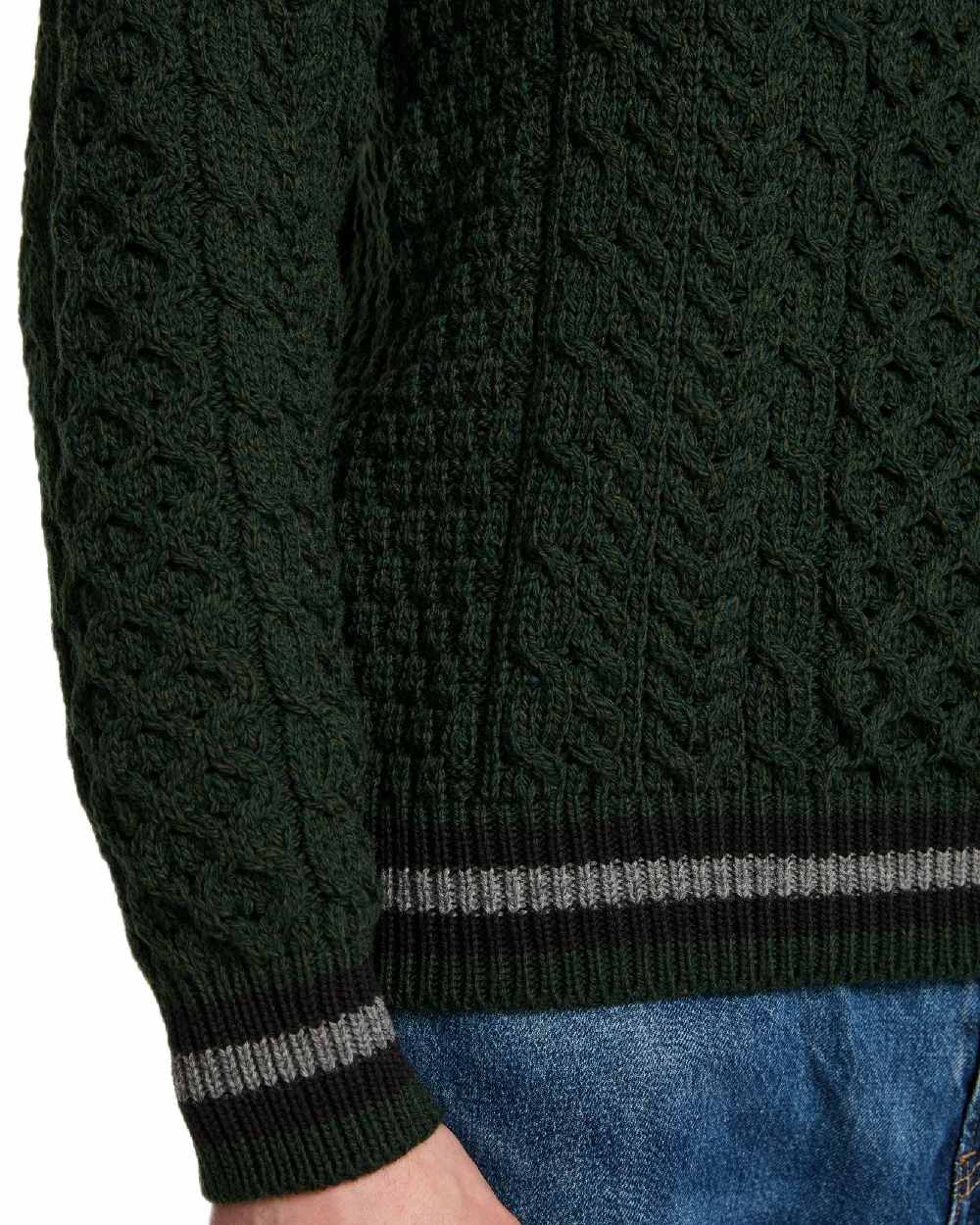 Green Coloured Aran Mens Inishbeg Stripe Crewneck Merino Sweater on white background 