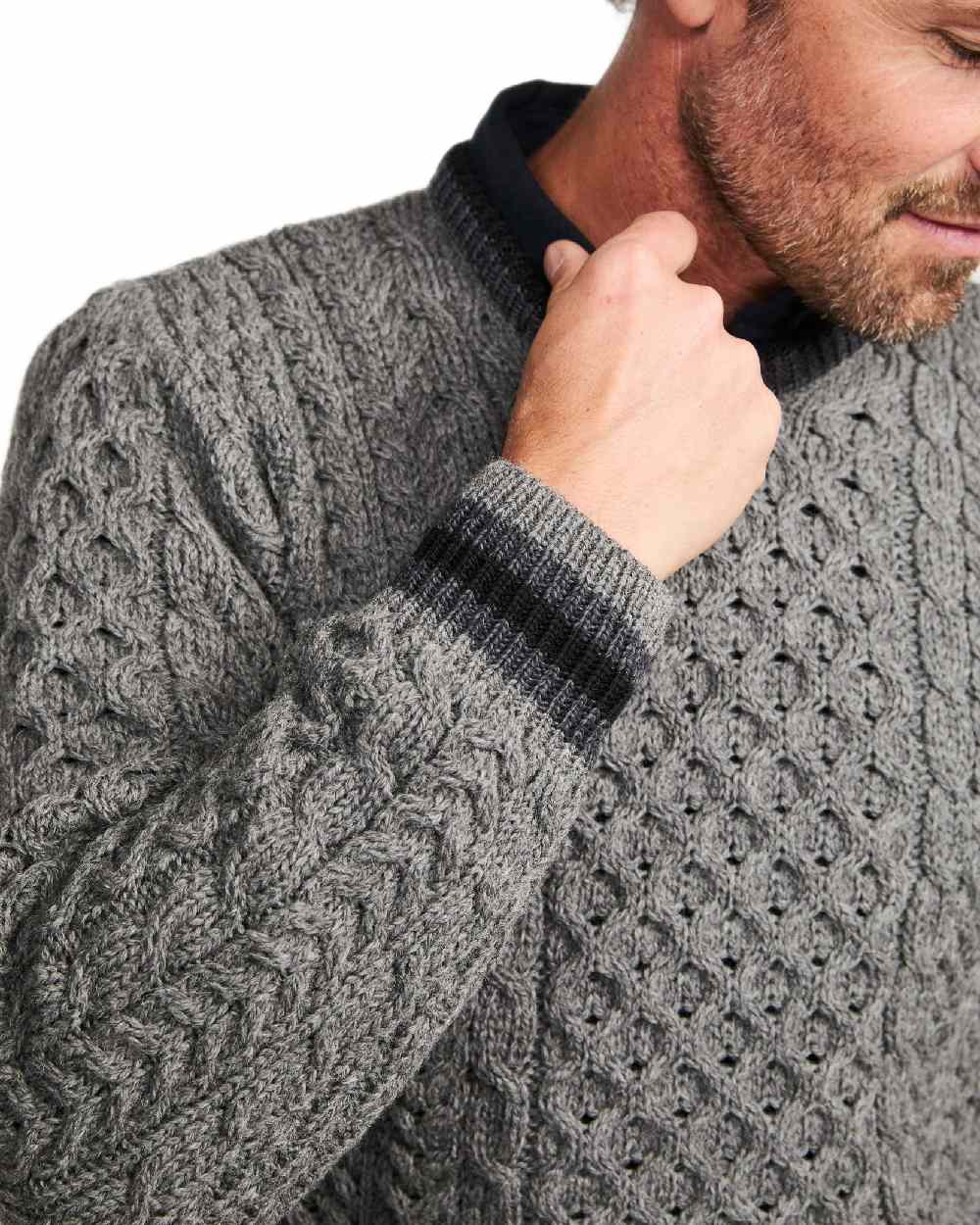 Grey Coloured Aran Mens Inishbeg Stripe Crewneck Merino Sweater on white background 