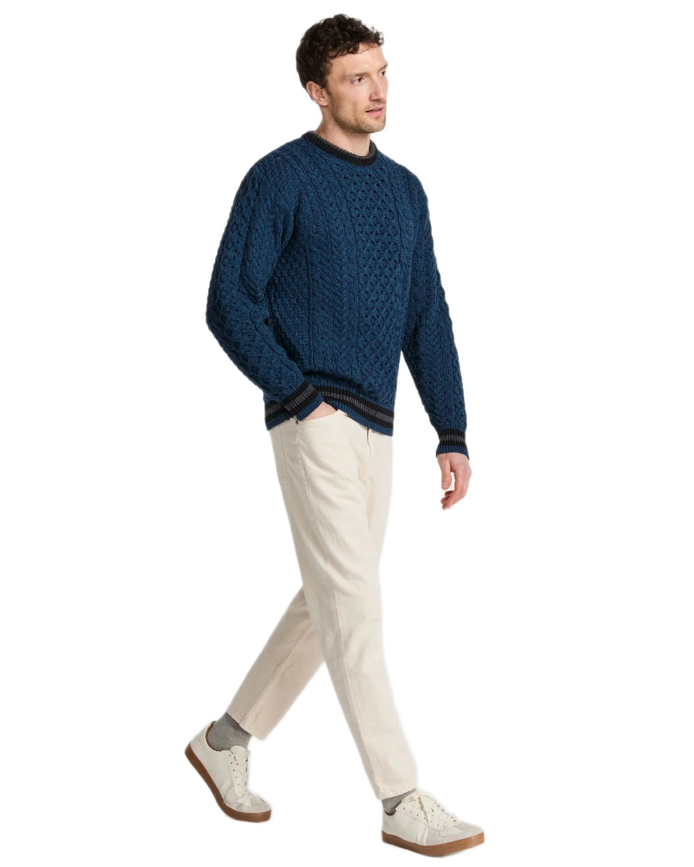 Teal Coloured Aran Mens Inishbeg Stripe Crewneck Merino Sweater on white background 