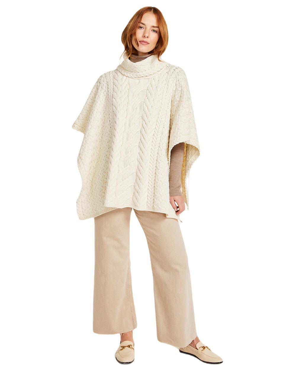 Cream Coloured Aran Merino Wool Cowl Neck Poncho on white background 