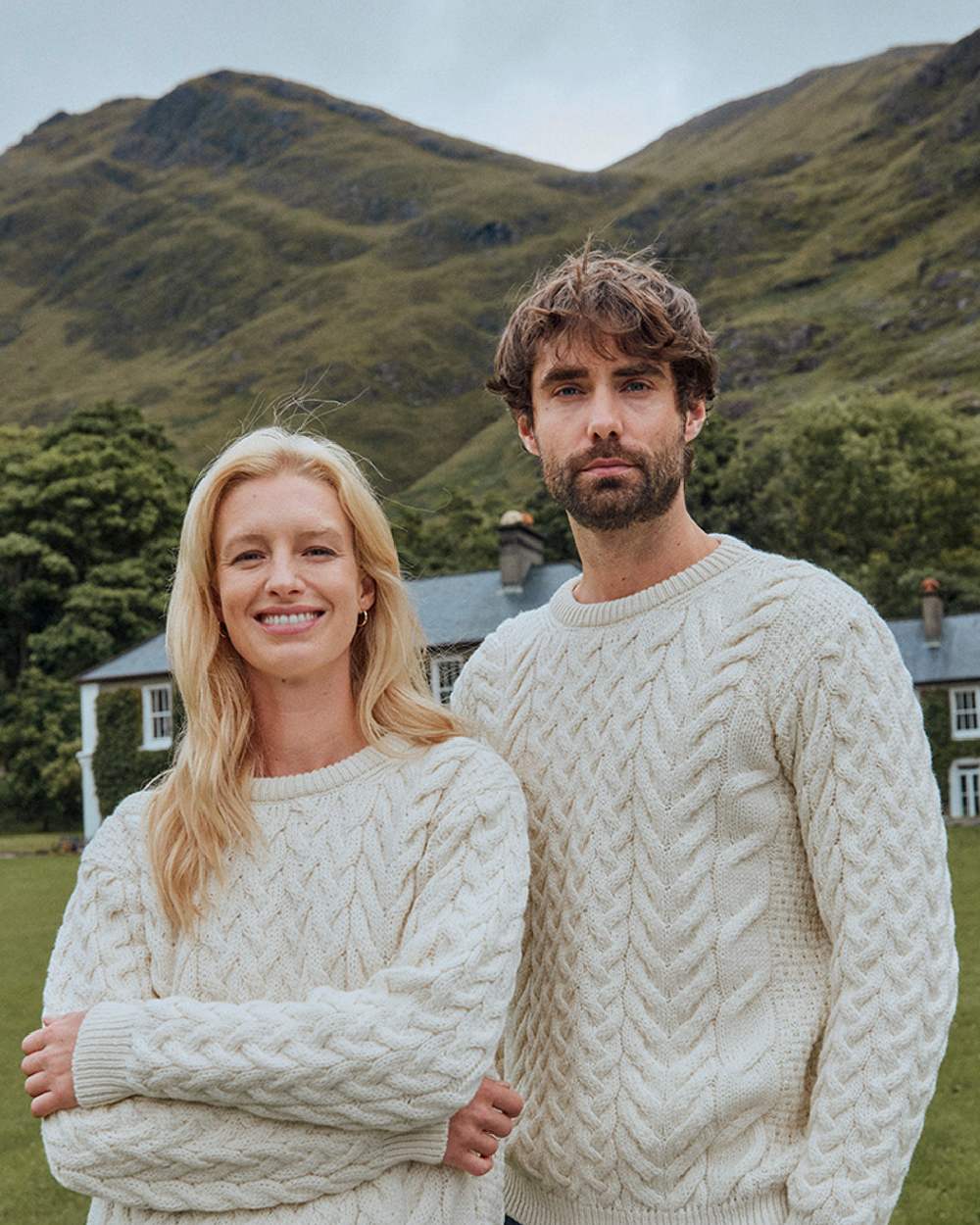 Cream Coloured Aran Merino Wool Crew Neck Jumper on mountain background 