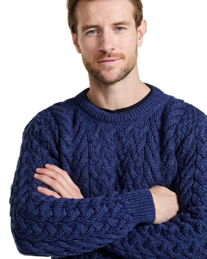 Deep Blue Coloured Aran Merino Wool Crew Neck Jumper on white background 