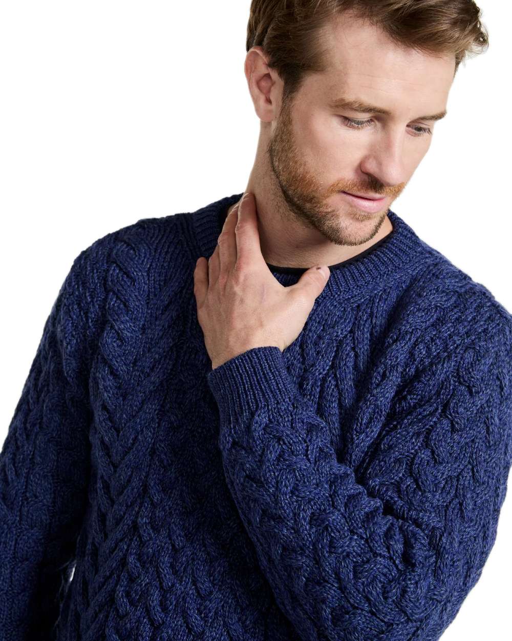 Deep Blue Coloured Aran Merino Wool Crew Neck Jumper on white background 