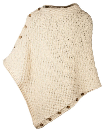 Cream Coloured Aran Merino Wool Knit Button Poncho on white background 