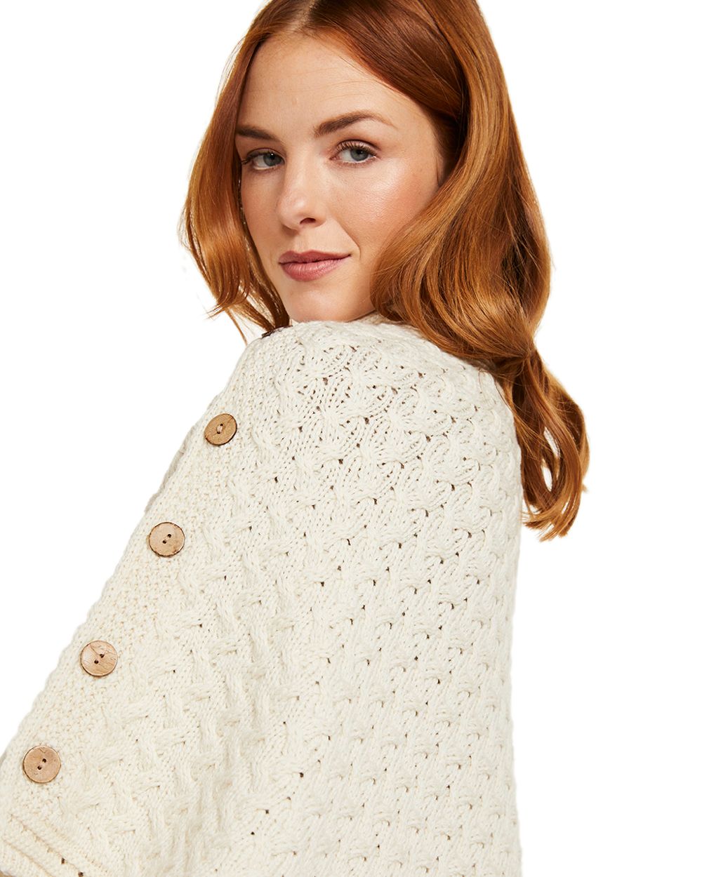 Cream Coloured Aran Merino Wool Knit Button Poncho on white background 