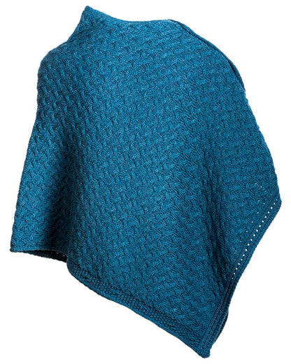 Teal Coloured Aran Merino Wool Knit Button Poncho on white background 