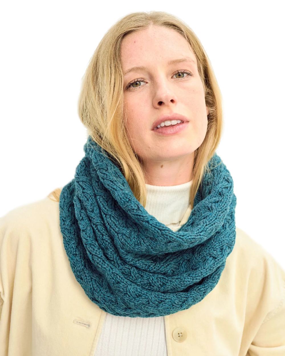 Teal coloured Aran Merino Wool Snood on white background 