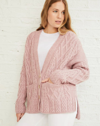 Blush Pink Coloured Aran Valentia Trellis Womens Cardigan on grey background 