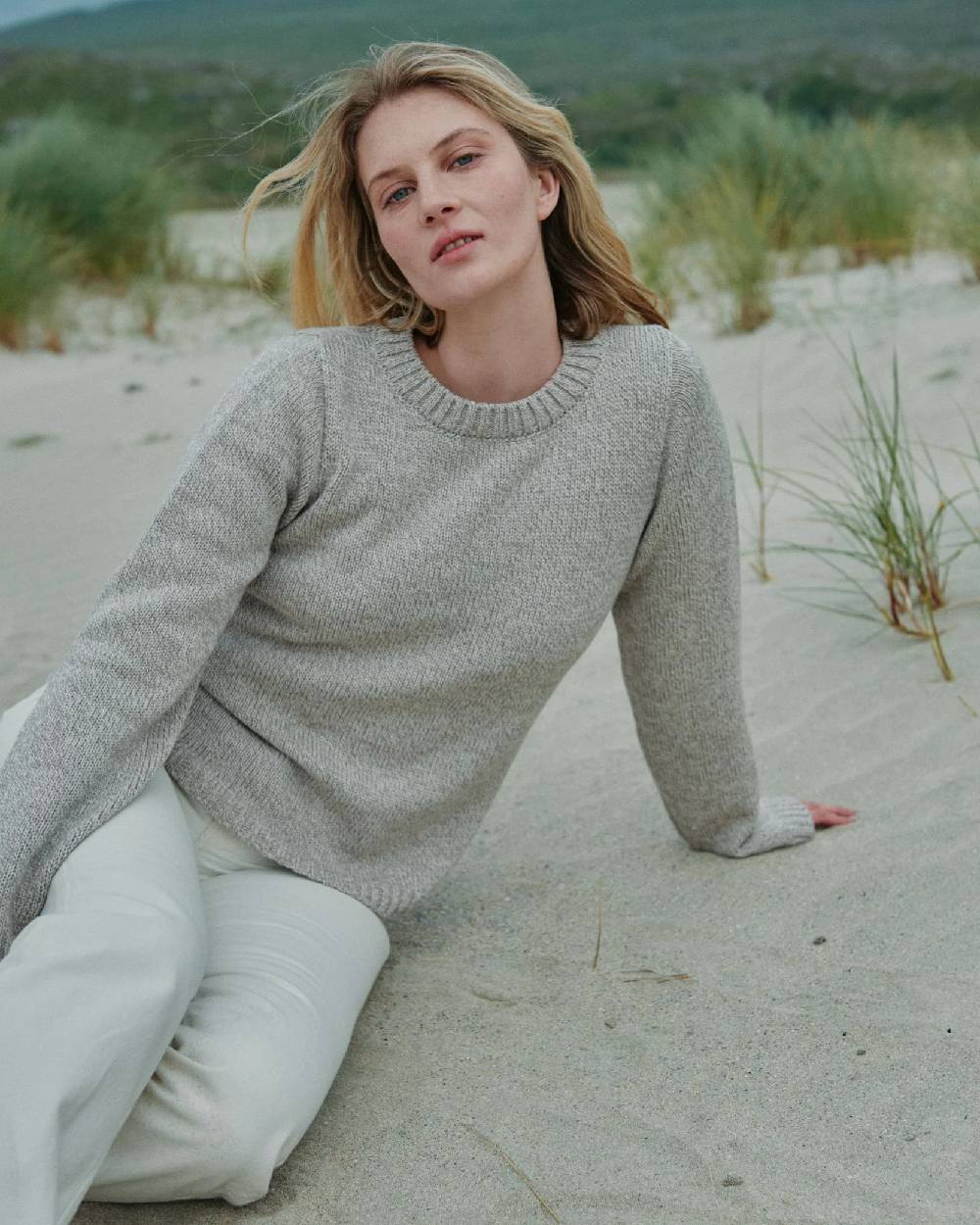 Oat Coloured Aran Womens Aoife Supersoft Crewneck Sweater on outdoor background 