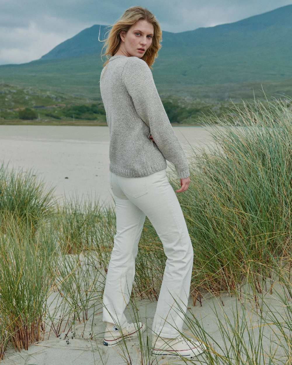 Oat Coloured Aran Womens Aoife Supersoft Crewneck Sweater on outdoor background 