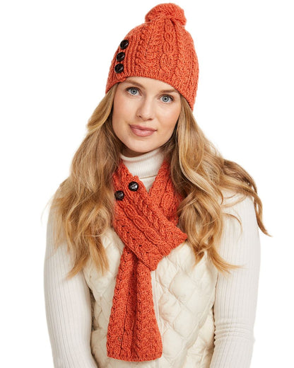 Red Orange Coloured Aran Womens Ballina Buttoned Loop Scarf on white background 