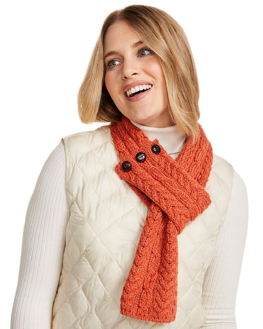 Red Orange Coloured Aran Womens Ballina Buttoned Loop Scarf on white background 