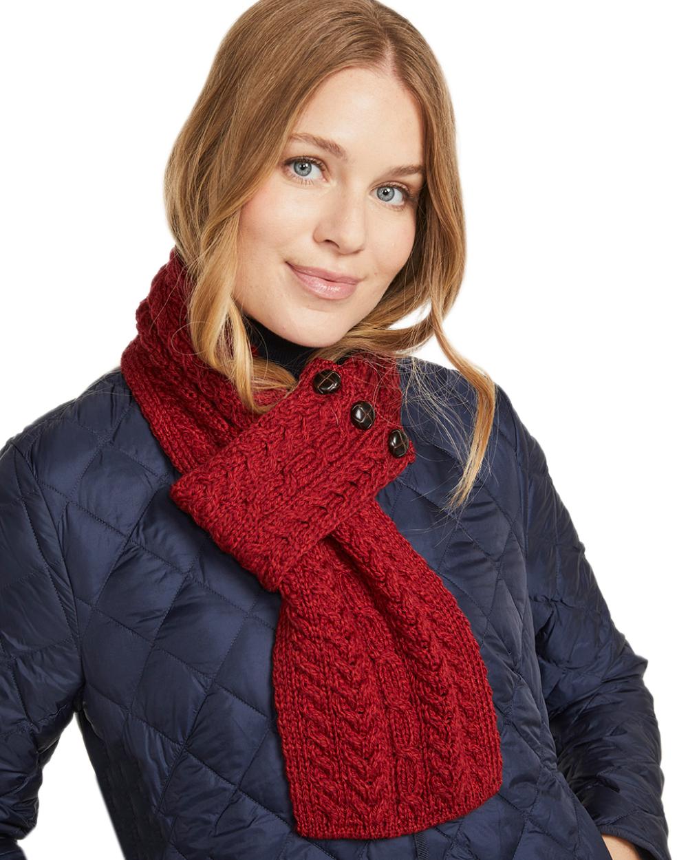 Red Coloured Aran Womens Ballina Buttoned Loop Scarf on white background 