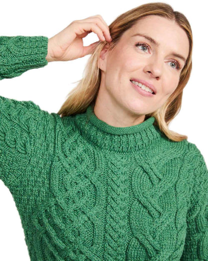 Green Coloured Aran Womens Calla Aysmmetrical Pattern Sweater on white background 