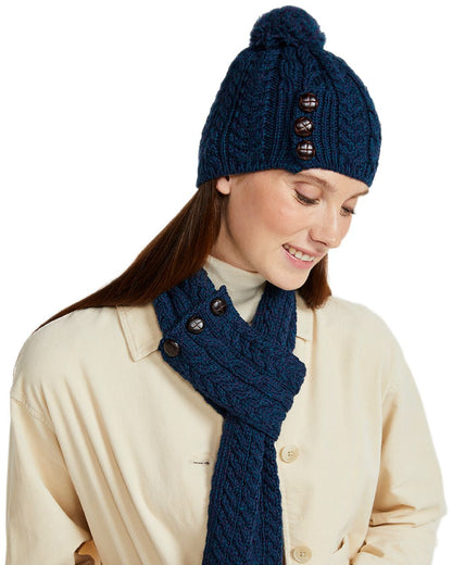 Atlantic Blue Coloured Aran Womens Cong Hat With Pom Pom on white background 