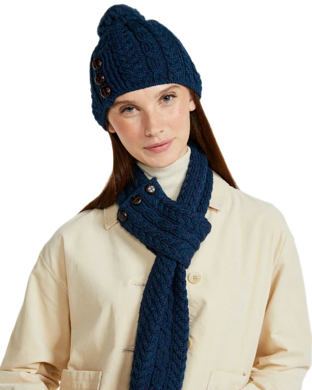 Atlantic Blue Coloured Aran Womens Cong Hat With Pom Pom on white background 