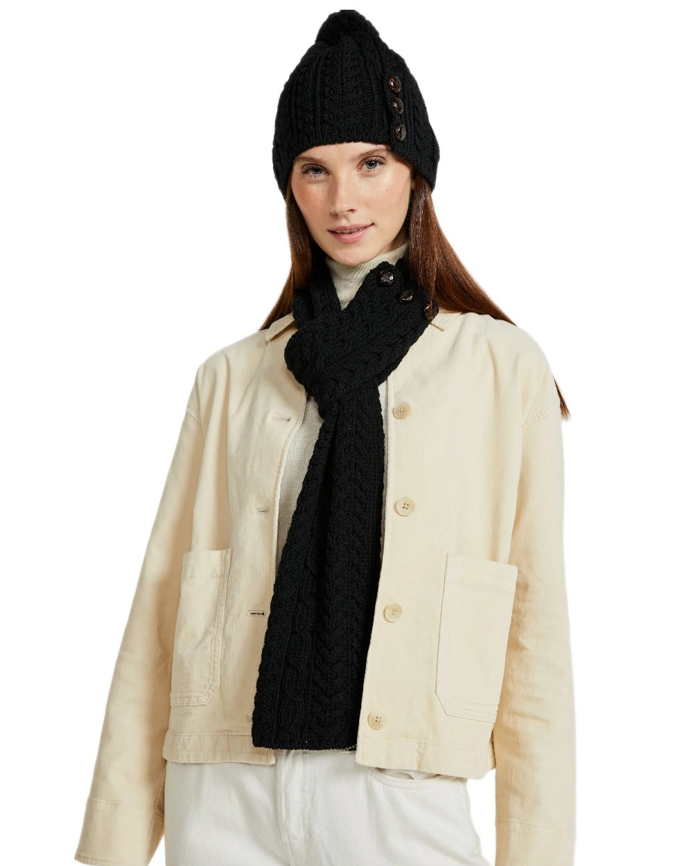 Black Coloured Aran Womens Cong Hat With Pom Pom on white background 