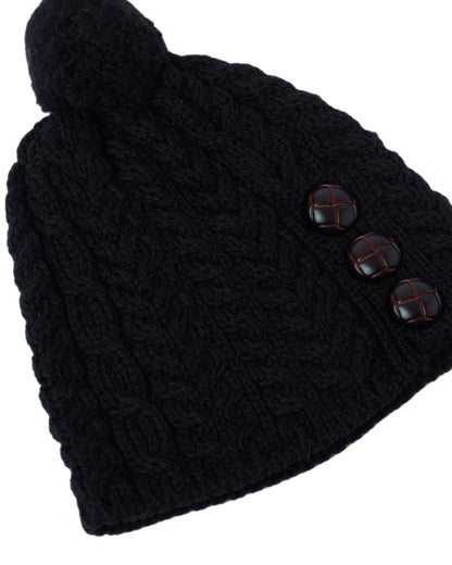 Black Coloured Aran Womens Cong Hat With Pom Pom on white background 