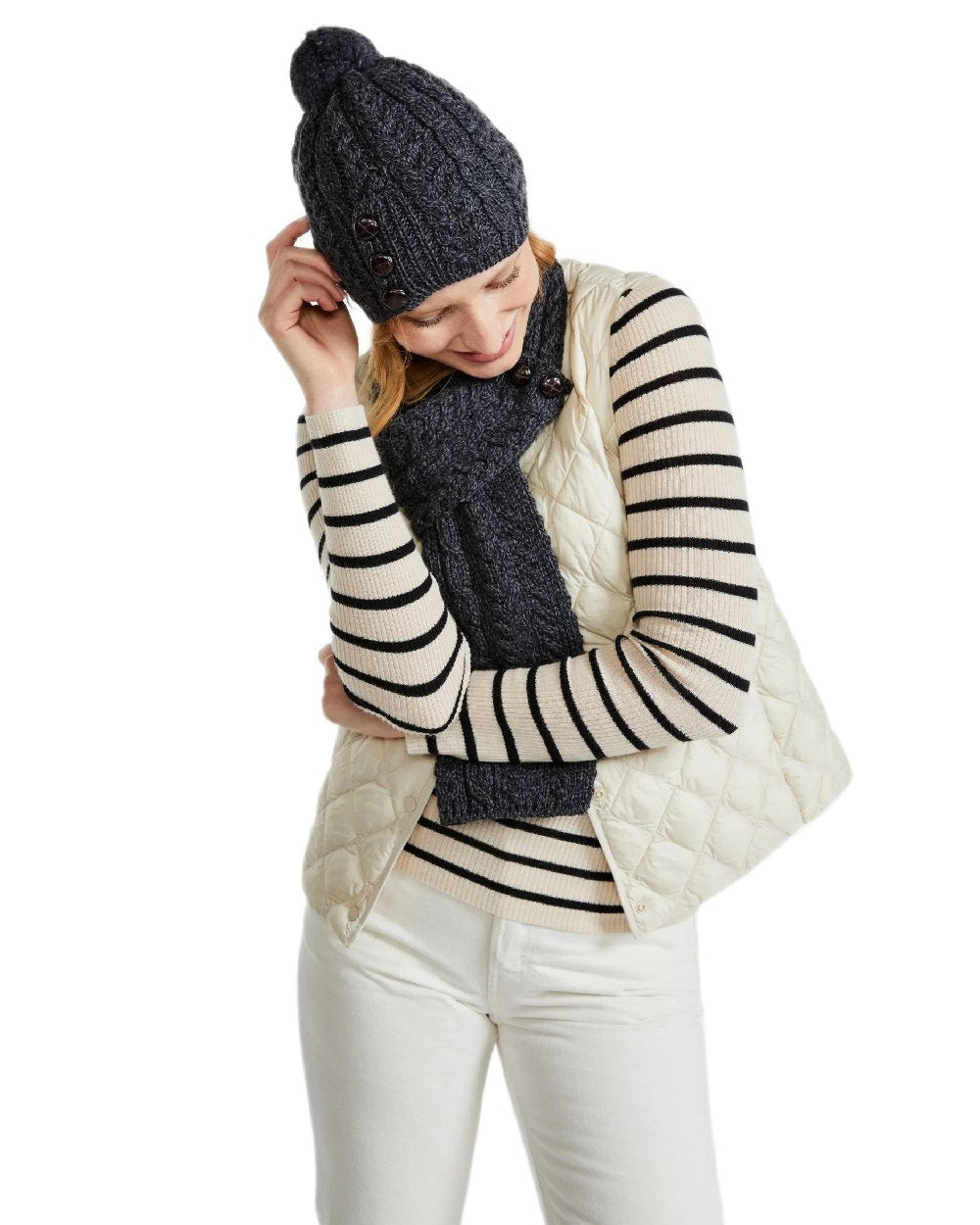 Charcoal Coloured Aran Womens Cong Hat With Pom Pom on white background 