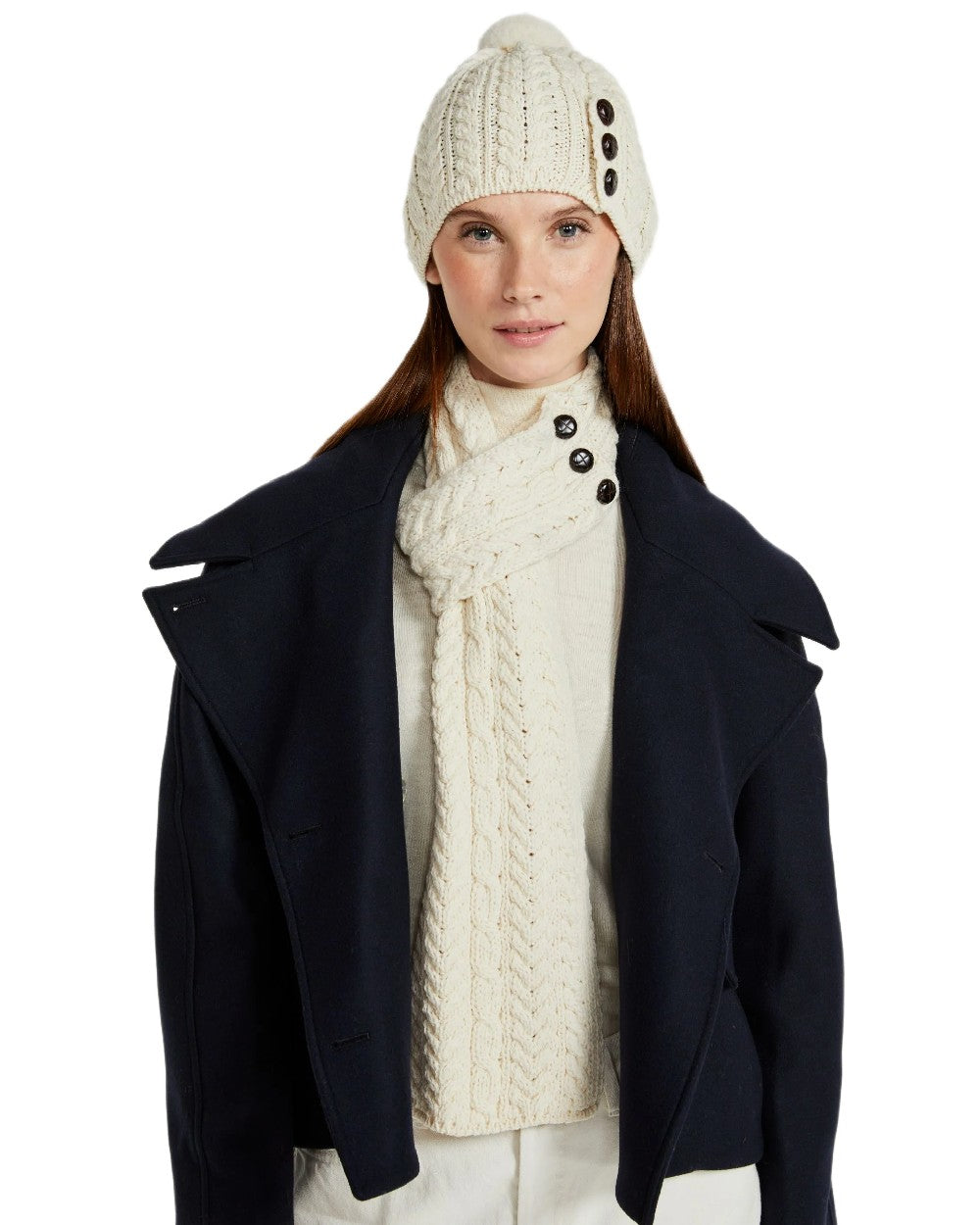 Cream Coloured Aran Womens Cong Hat With Pom Pom on white background 