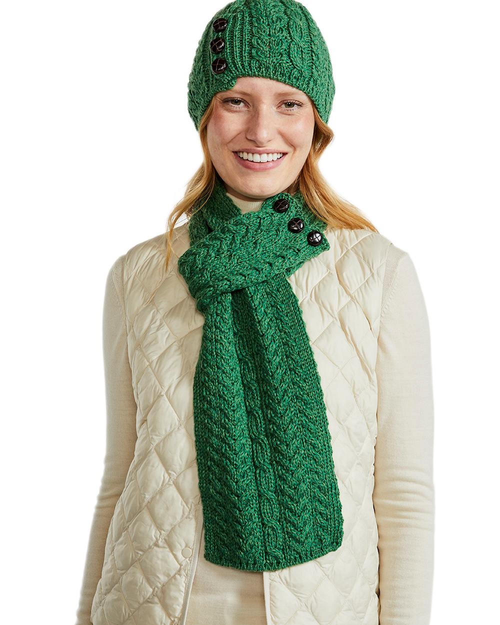 Green Coloured Aran Womens Cong Hat With Pom Pom on white background 