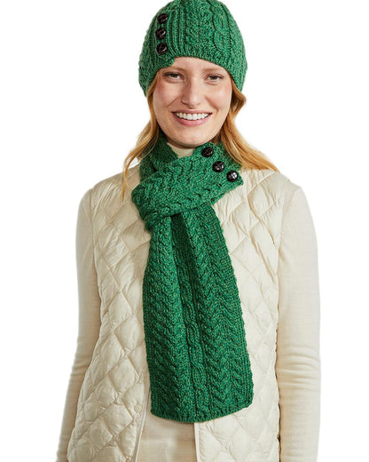 Green Coloured Aran Womens Cong Hat With Pom Pom on white background 