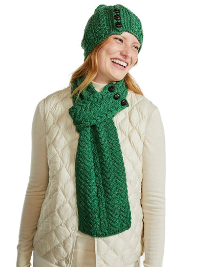Green Coloured Aran Womens Cong Hat With Pom Pom on white background 