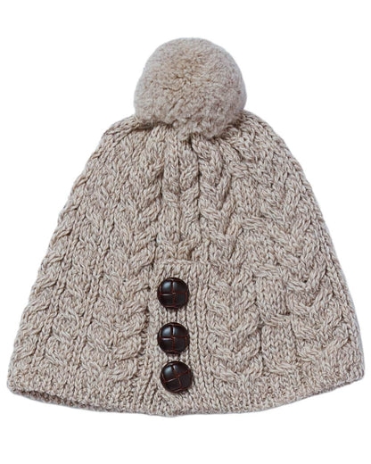 Oat Coloured Aran Womens Cong Hat With Pom Pom on white background 