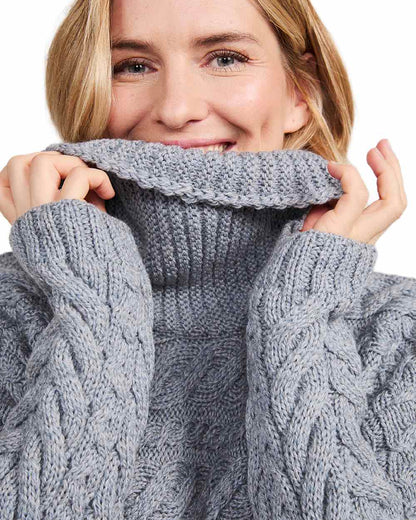 Denim Coloured Aran Womens Derreen Horizontal Cable Sweater on white background 