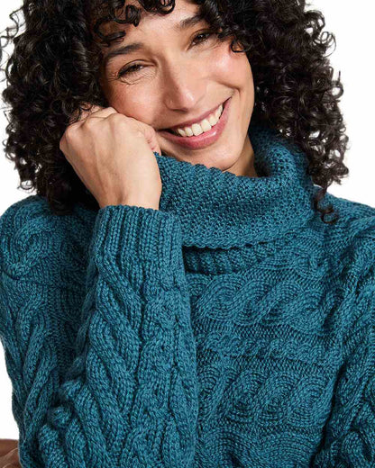 Teal Coloured Aran Womens Derreen Horizontal Cable Sweater on white background 
