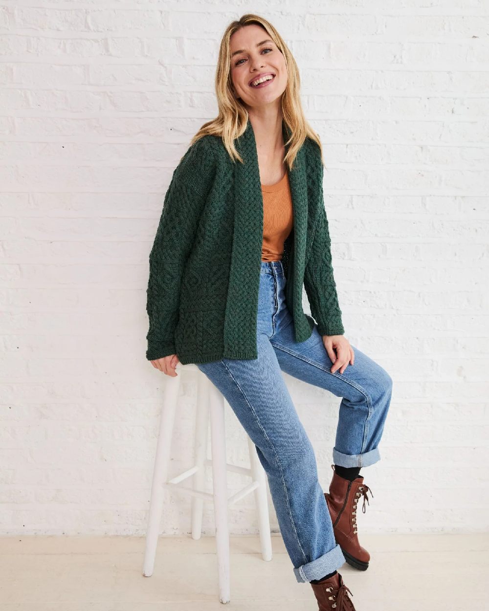 Green Coloured Aran Womens Liffey Merino Shawl Cardigan on indoor background 