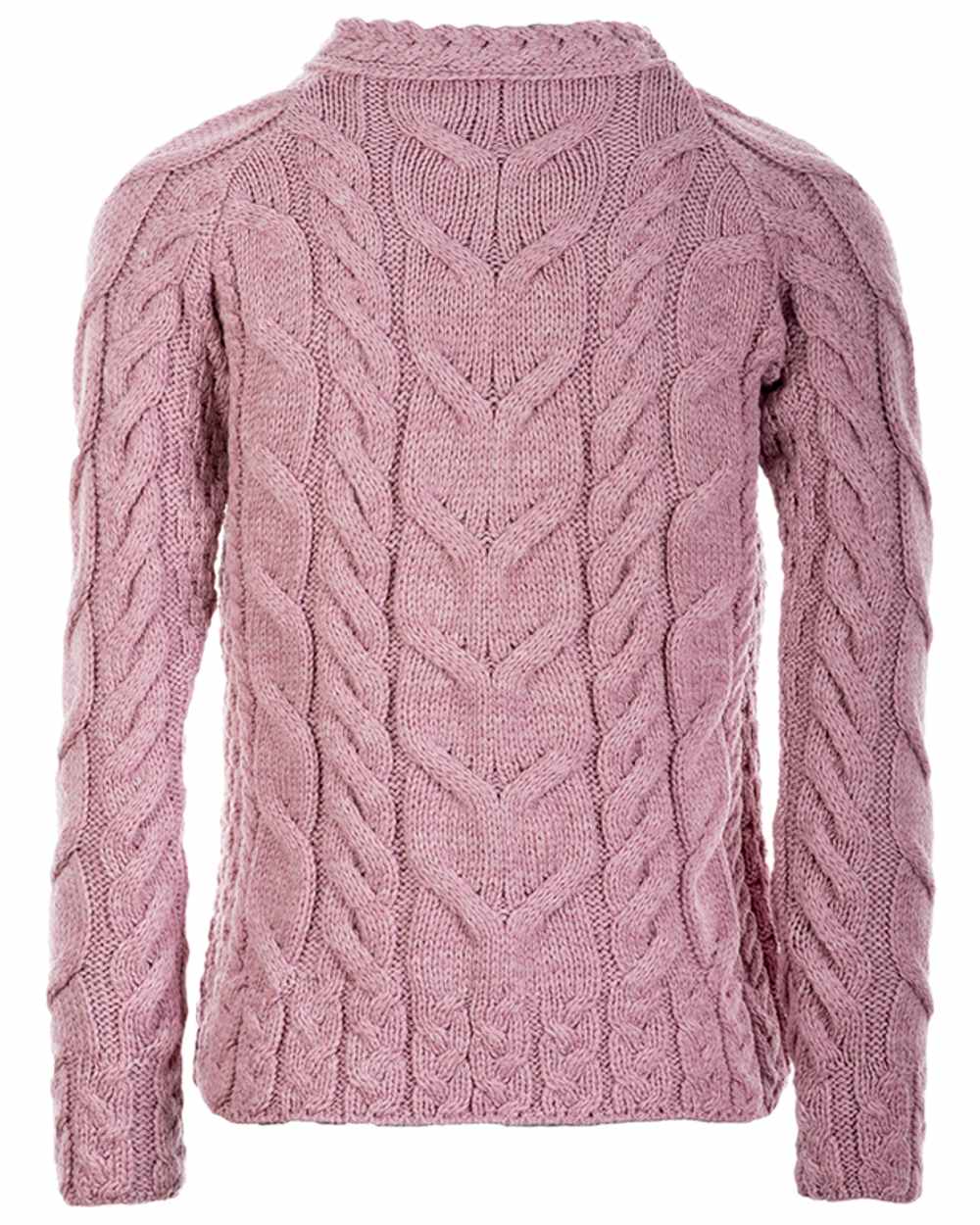 Pink Coloured Aran Womens Listowel Cabled Sweater on curtain background 