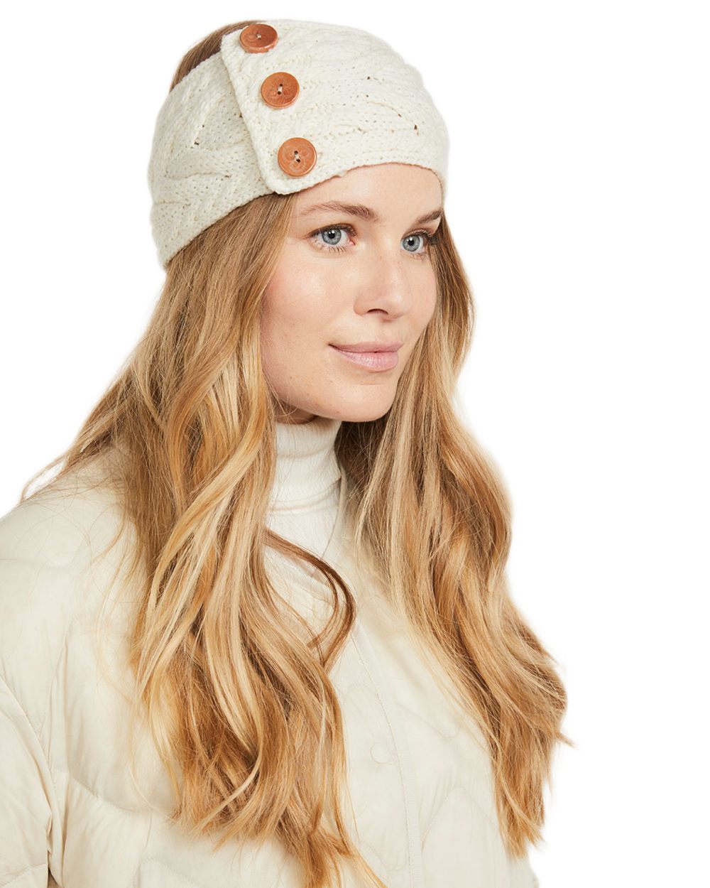 Cream coloured Aran Womens Multi Cable Headband With Buttons on white background 