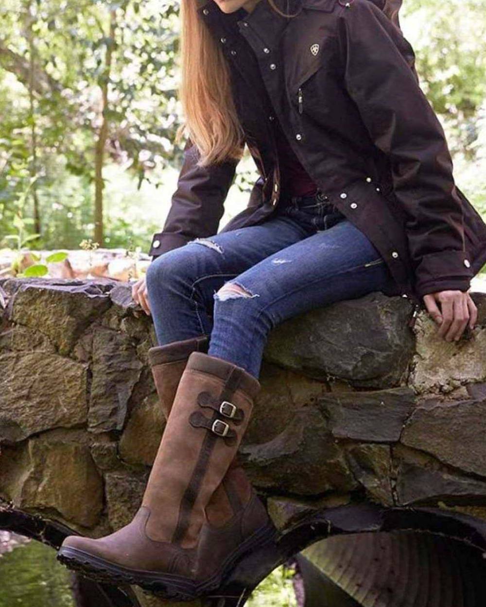 Java coloured Ariat Eskdale H20 Waterproof Boots on lake background 