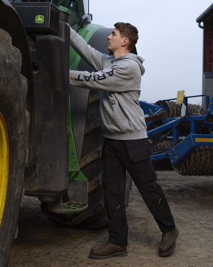 Heather Grey Deep Ultramarine Coloured Ariat Mens Rebar Graphic Hoodie on outdoor background 