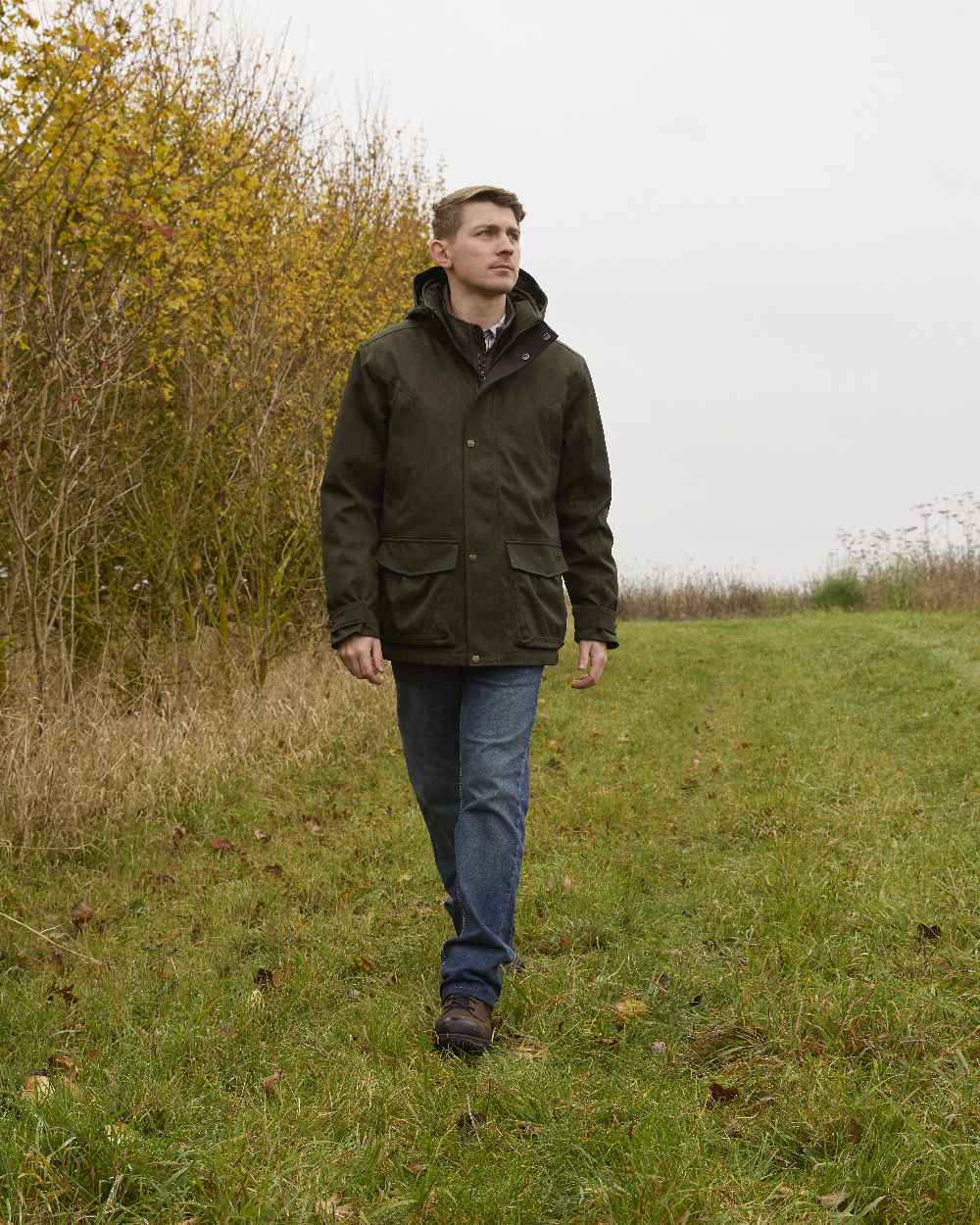 Rosin coloured Ariat Mens Rhodium H2O Insulated Parka on forest background 