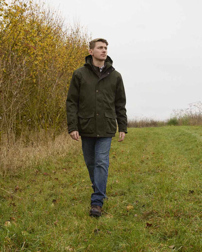 Rosin coloured Ariat Mens Rhodium H2O Insulated Parka on forest background 