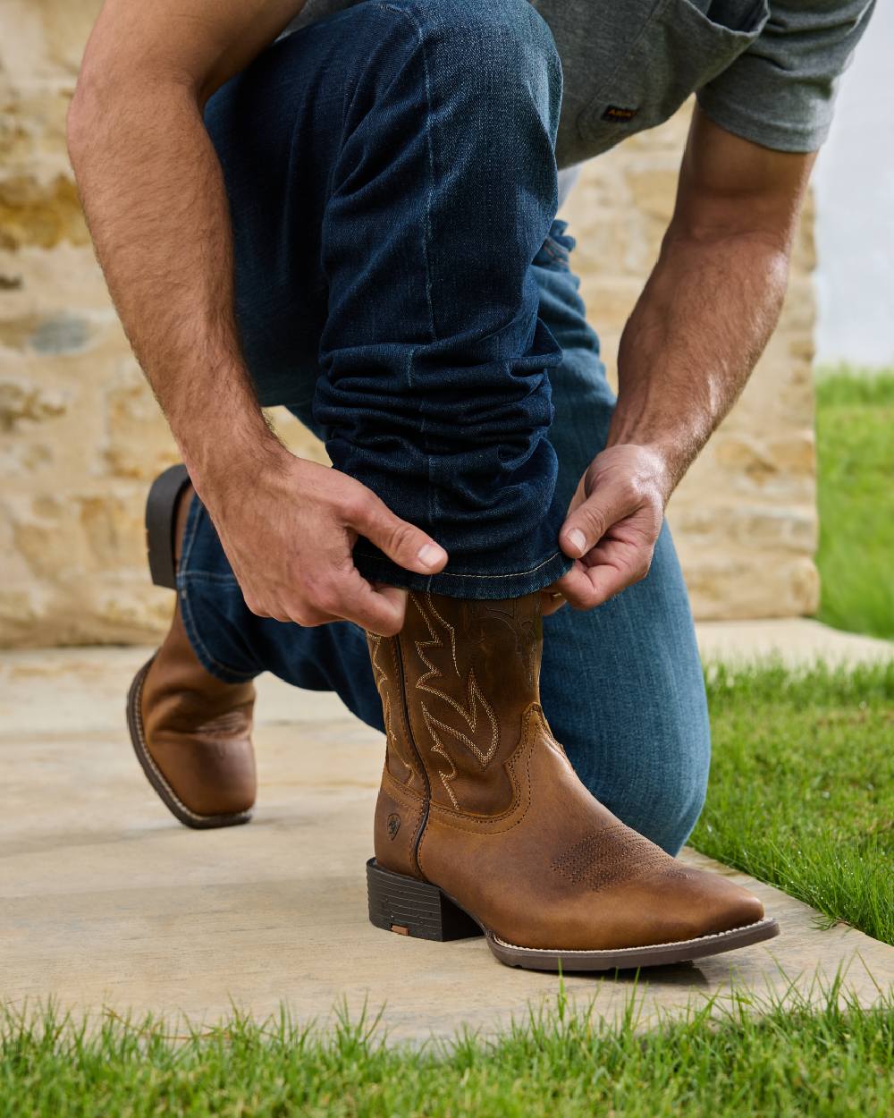 Fremont Coloured Ariat Mens Rocker Stretch Legacy Stackable Straight Leg Jeans on outdoor background 